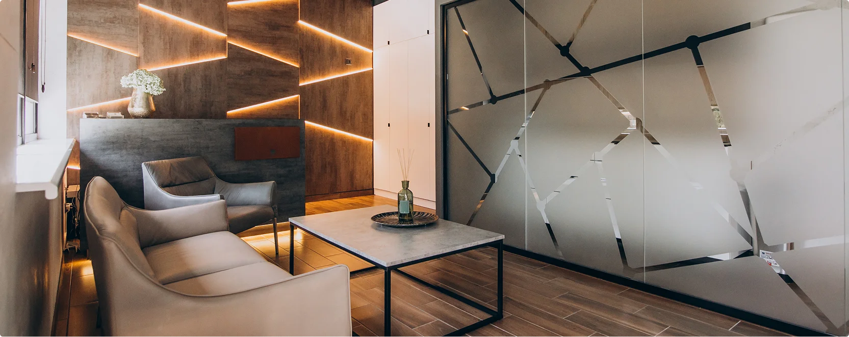 a room with a glass door and a table