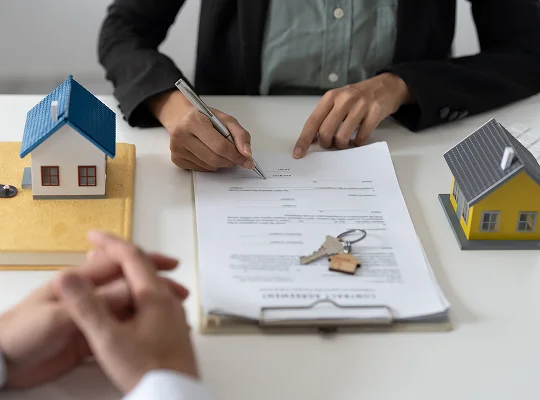 a person signing a contract