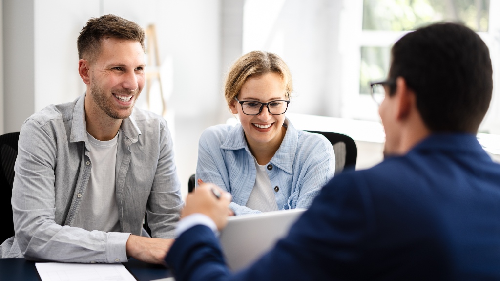 Young couple is consulting with lawyer