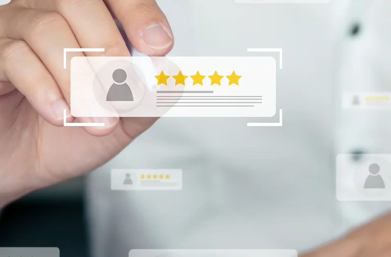 a hand touching a screen with a few stars and a star
