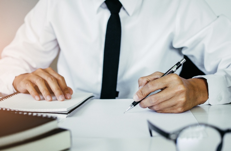 Man is working with documents
